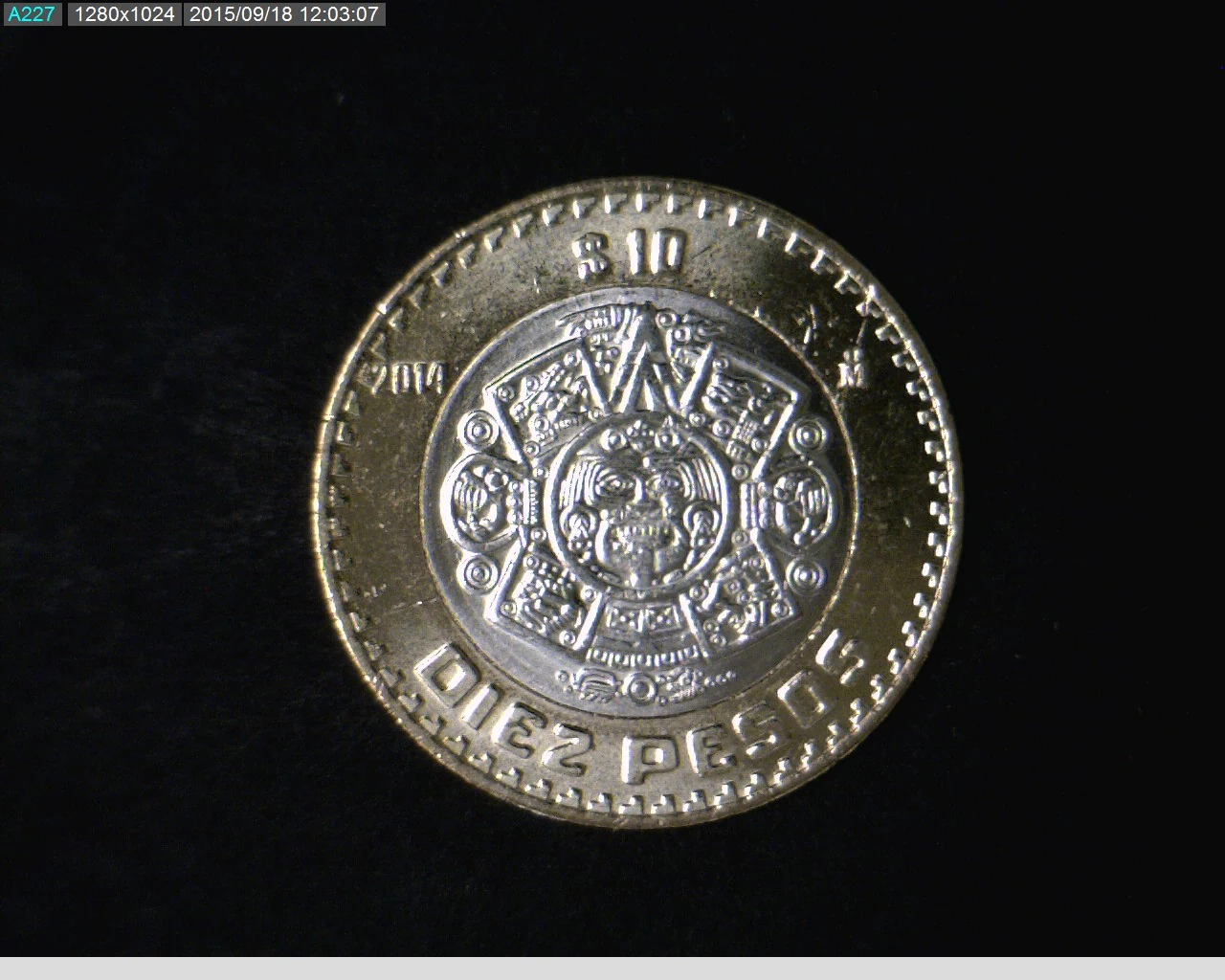 10 Bimetálica 2014 . Inventario Banxico 23219 (reverso)