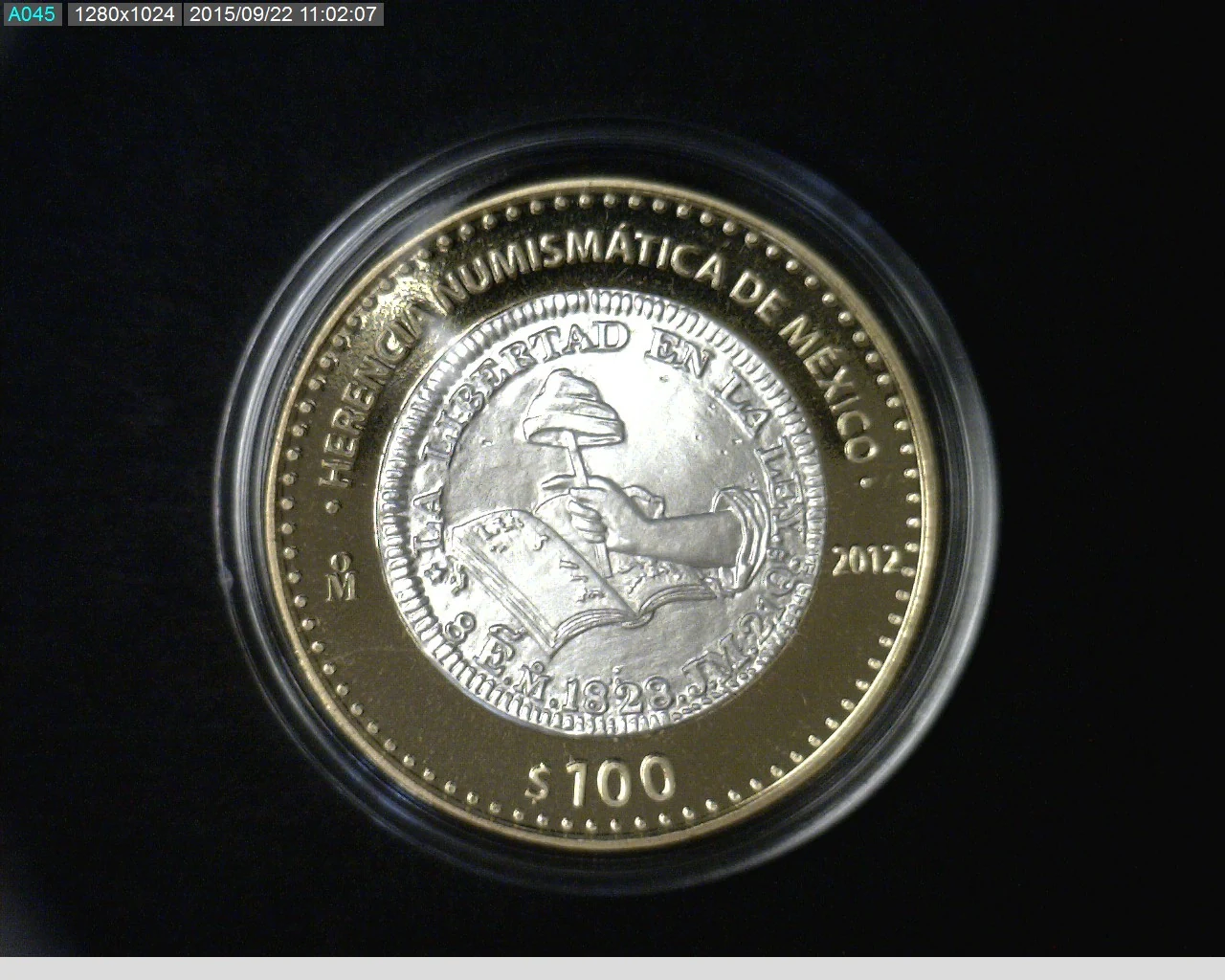 100 Pesos Herencia Numismatica II, Peso de Manita 2012 · Reverso