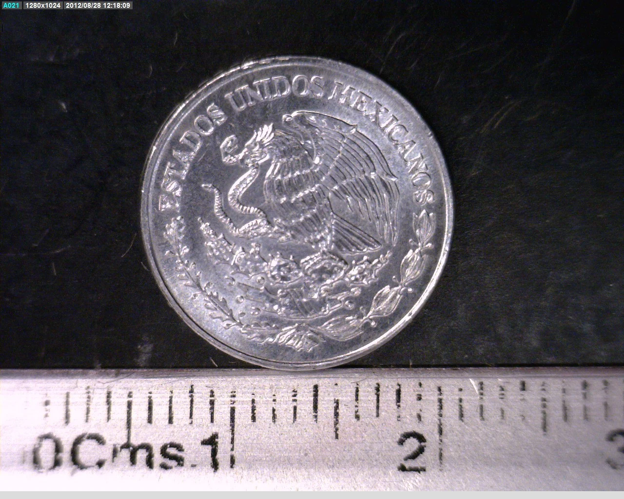 20 Centavos Acero inoxidable 2009 · Anverso