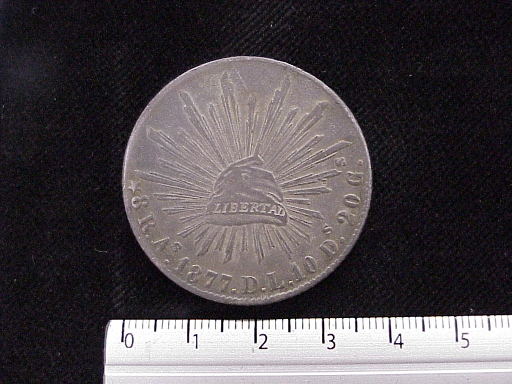 8 Plata 1877 . Inventario Banxico 5717 (reverso)