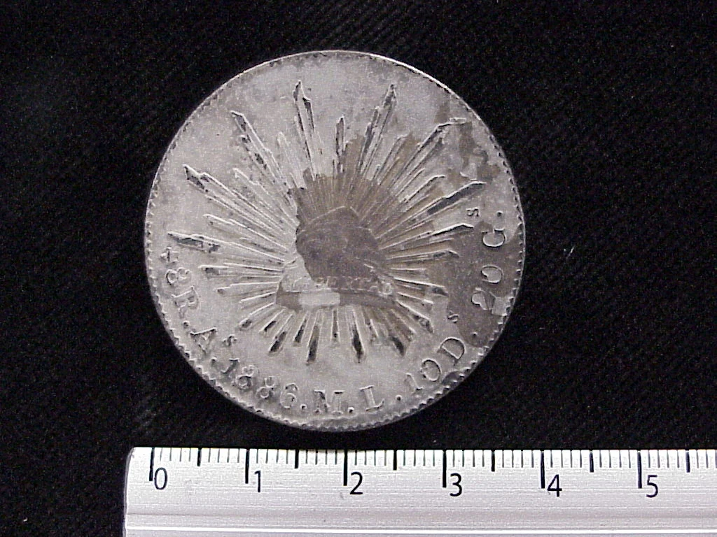 8 Plata 1886 . Inventario Banxico 5747 (reverso)