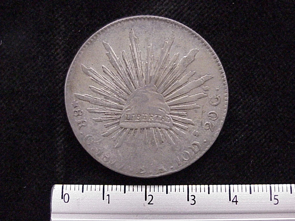 8 Plata 1877 . Inventario Banxico 6558 (reverso)
