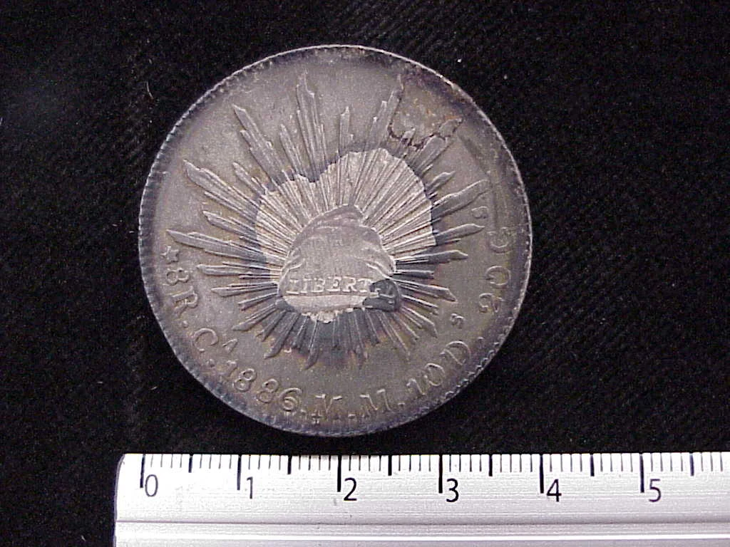 8 Plata 1886 . Inventario Banxico 6604 (reverso)