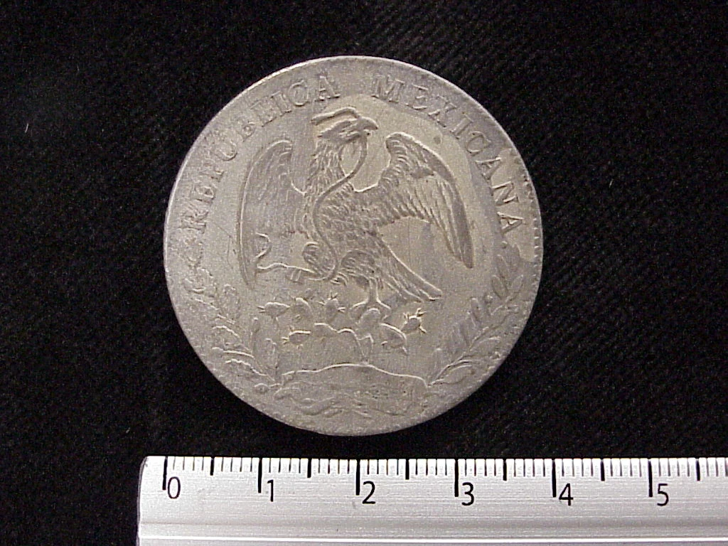8 Plata 1876 . Inventario Banxico 6001 (anverso)