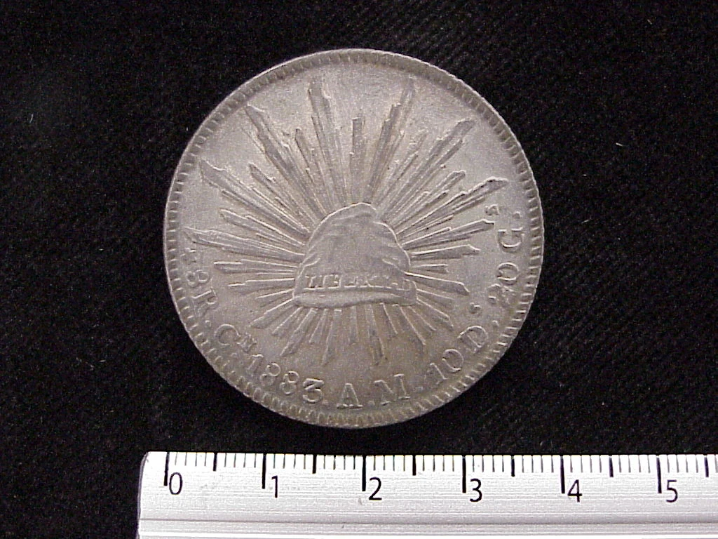 8 Plata 1883 . Inventario Banxico 6034 (reverso)