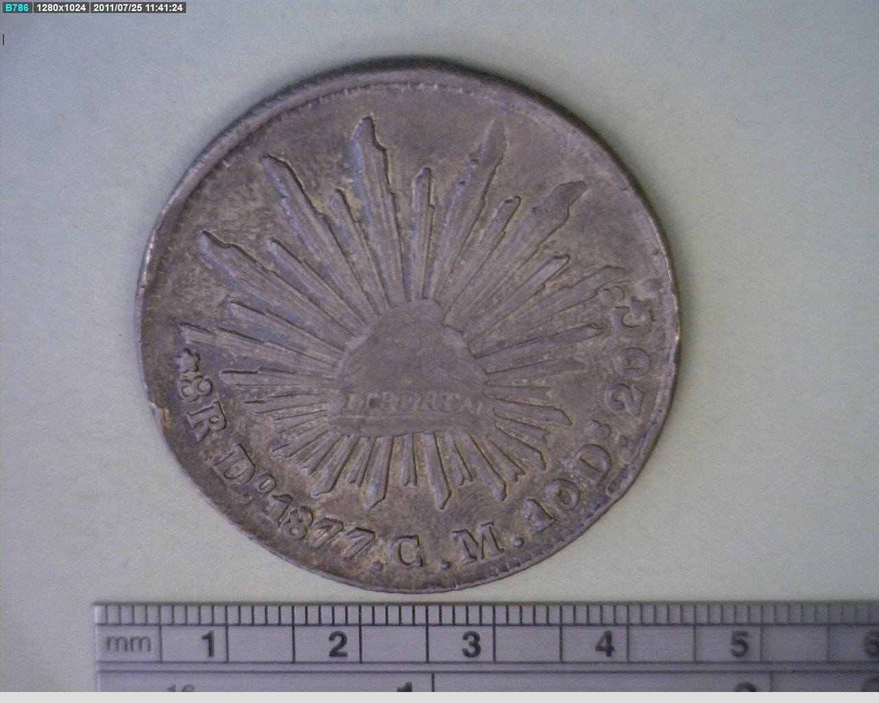 8 Plata 1877 . Inventario Banxico 16744 (reverso)
