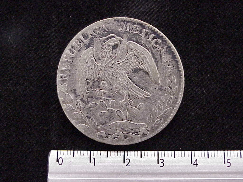 8 Plata 1886 . Inventario Banxico 7014 (reverso)
