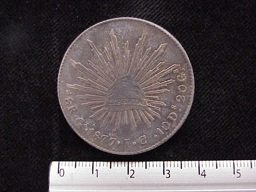 8 Plata 1877 . Inventario Banxico 7460 (reverso)