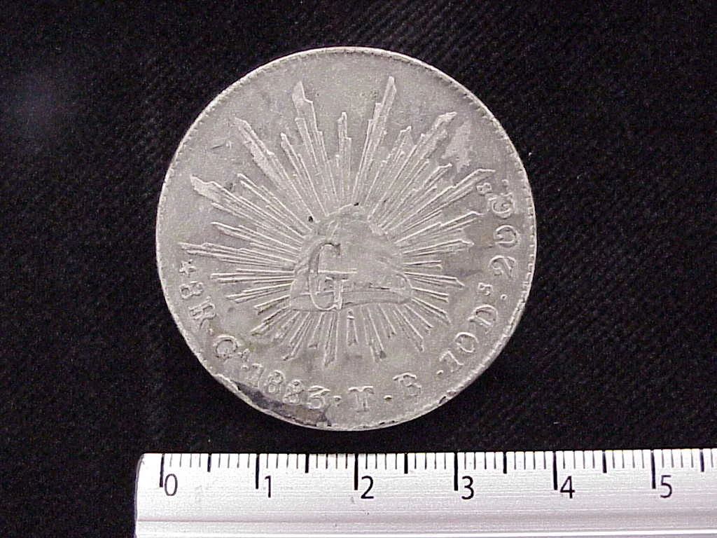 8 Plata 1883 . Inventario Banxico 7483 (reverso)