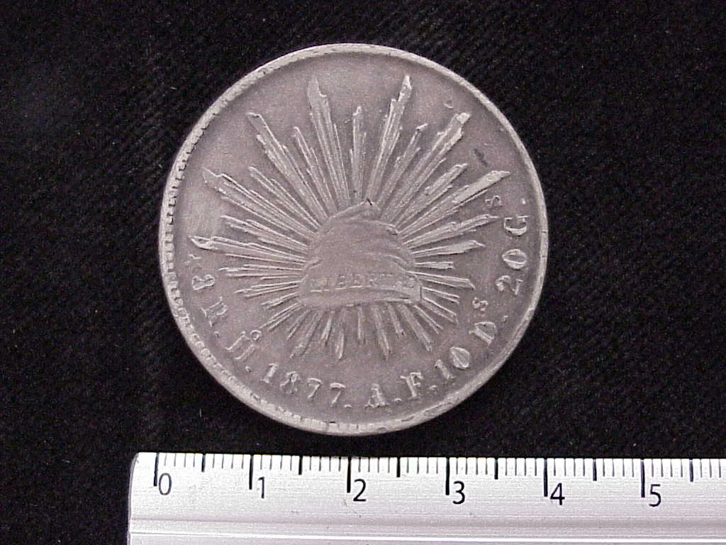 8 Plata 1877 . Inventario Banxico 9180 (reverso)