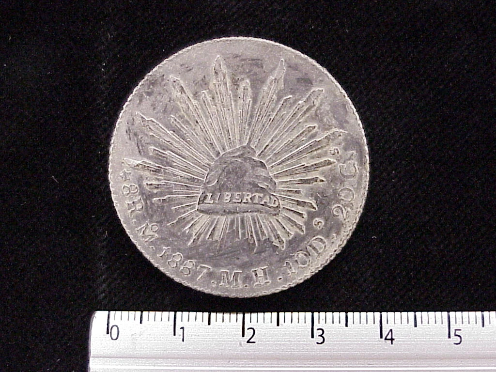 8 Plata 1887 . Inventario Banxico 4437 (reverso)