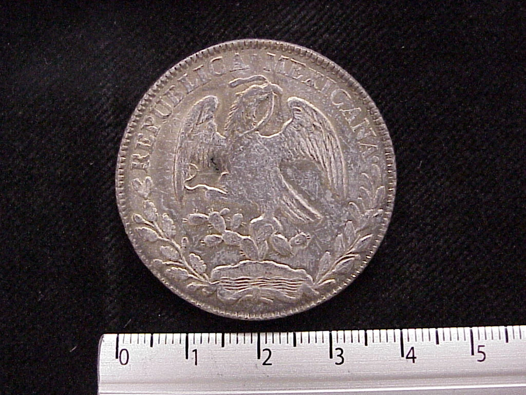 8 Plata 1877 . Inventario Banxico 10315 (anverso)
