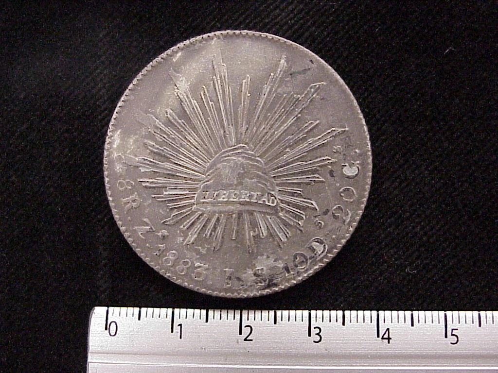 8 Plata 1883 . Inventario Banxico 10335 (reverso)