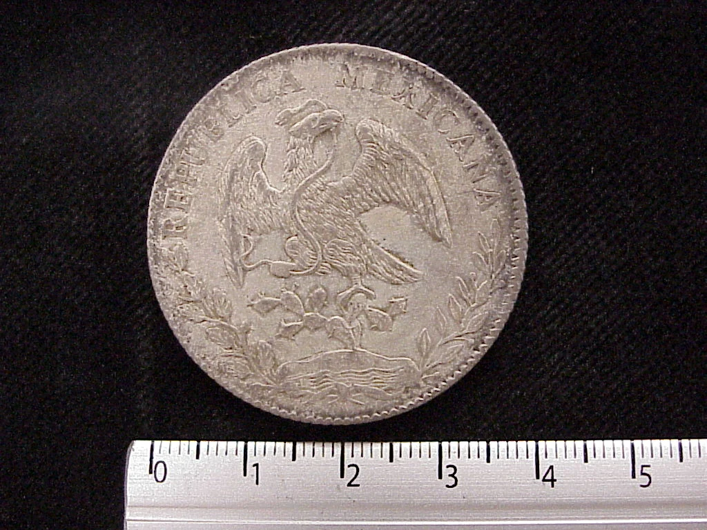 8 Plata 1885 . Inventario Banxico 10341 (anverso)