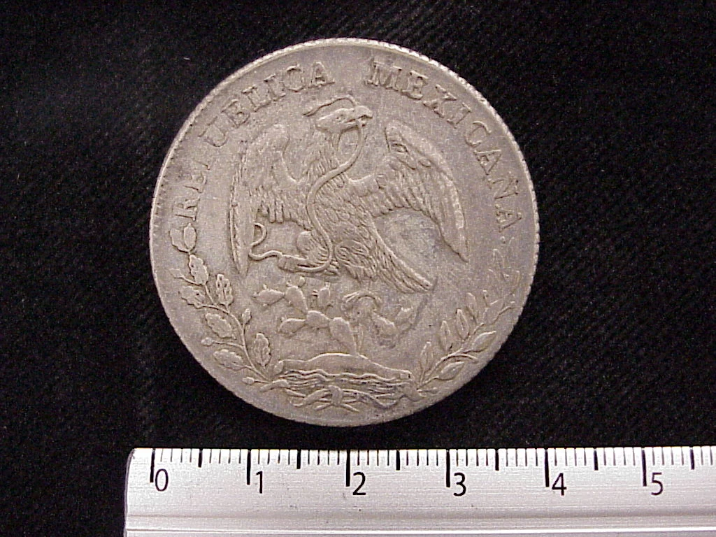 8 Plata 1886 . Inventario Banxico 10345 (anverso)