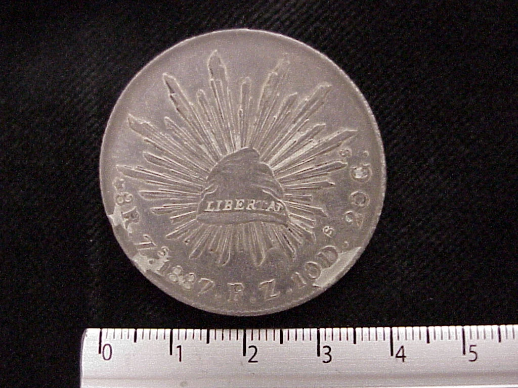8 Plata 1887 . Inventario Banxico 10350 (reverso)