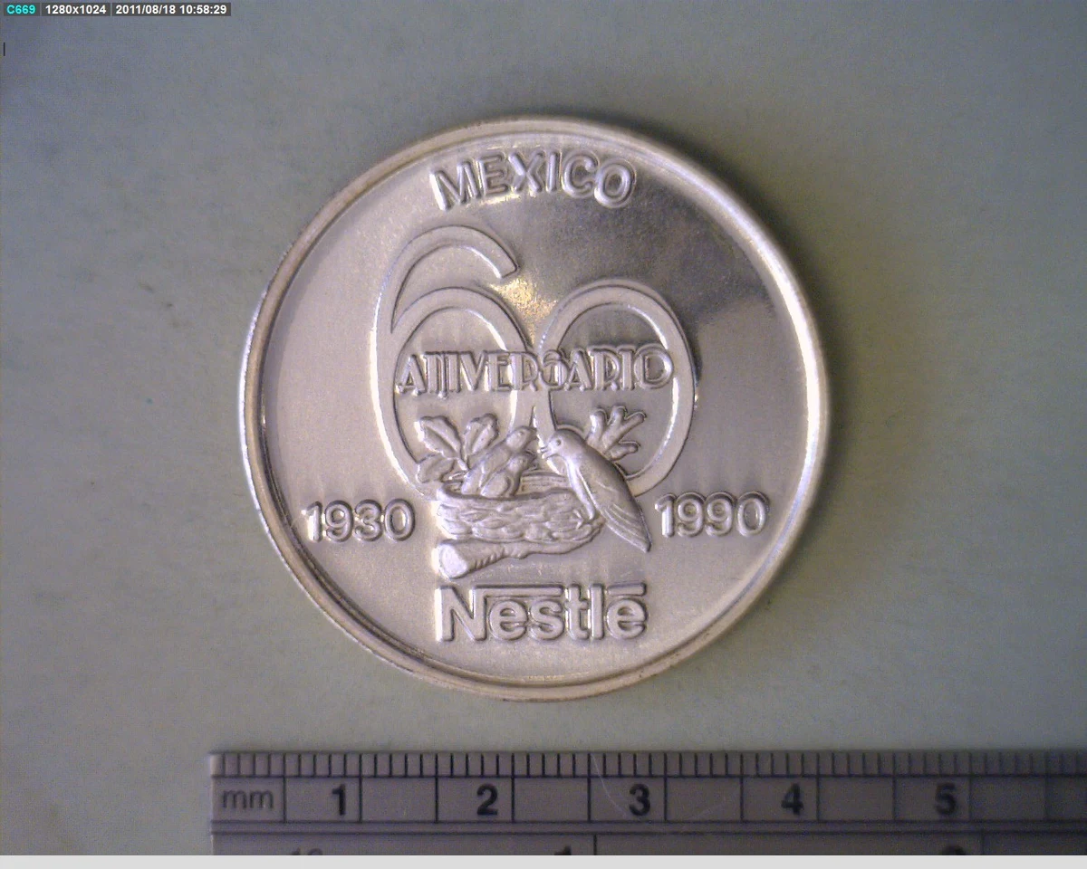 Medalla Nestlé. 60 Aniversario (1990) (anverso)