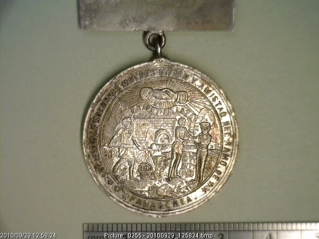 Medalla Sociedad de Socorros Mutuos Ramo de Panadería (1877) (anverso)