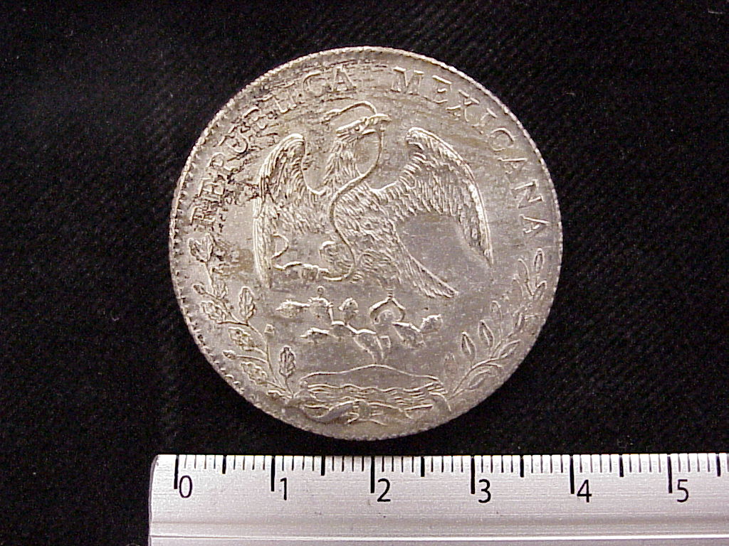8 Plata 1883 . Inventario Banxico 10335 (anverso)