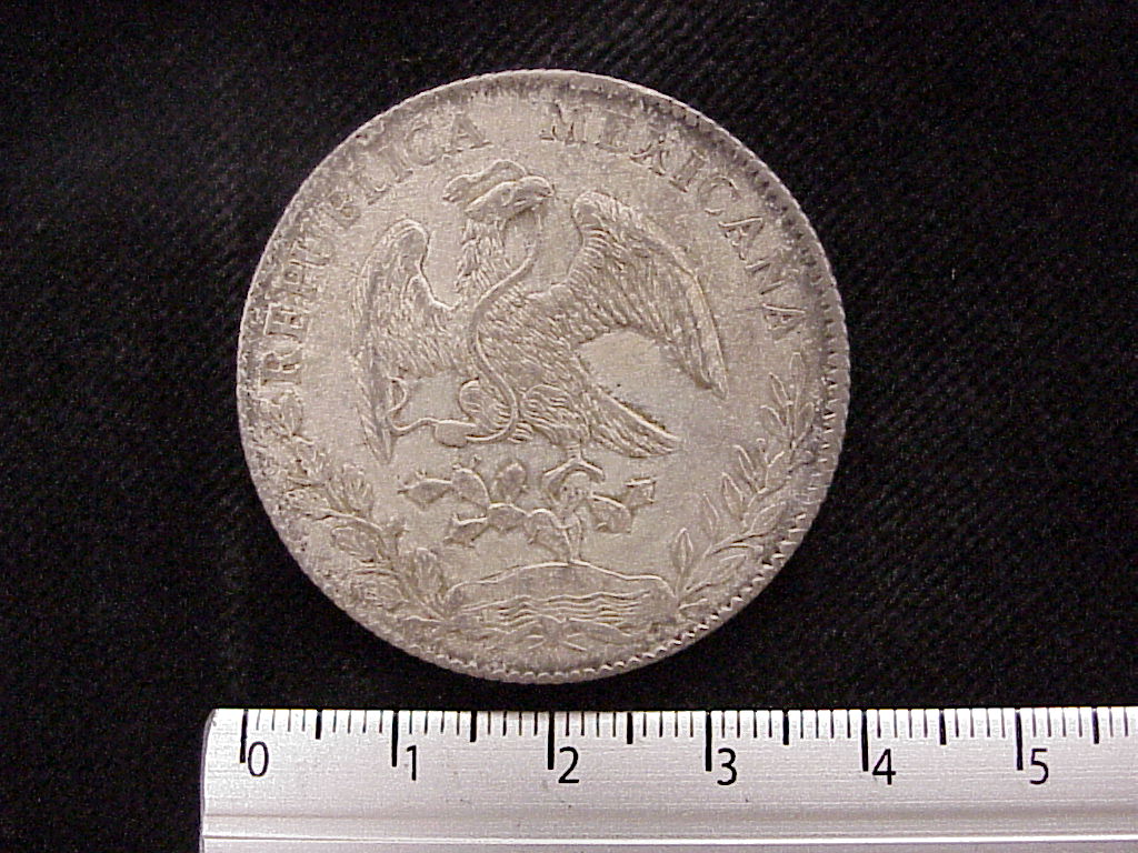 8 Plata 1885 . Inventario Banxico 10341 (anverso)