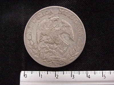 8 Plata 1886 . Inventario Banxico 10345 (anverso)