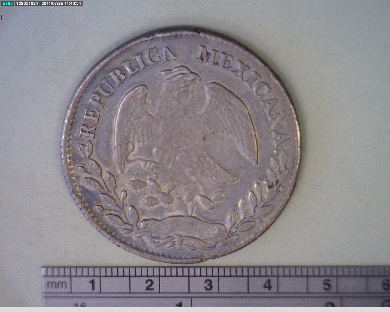 8 Plata 1877 . Inventario Banxico 16744 (anverso)