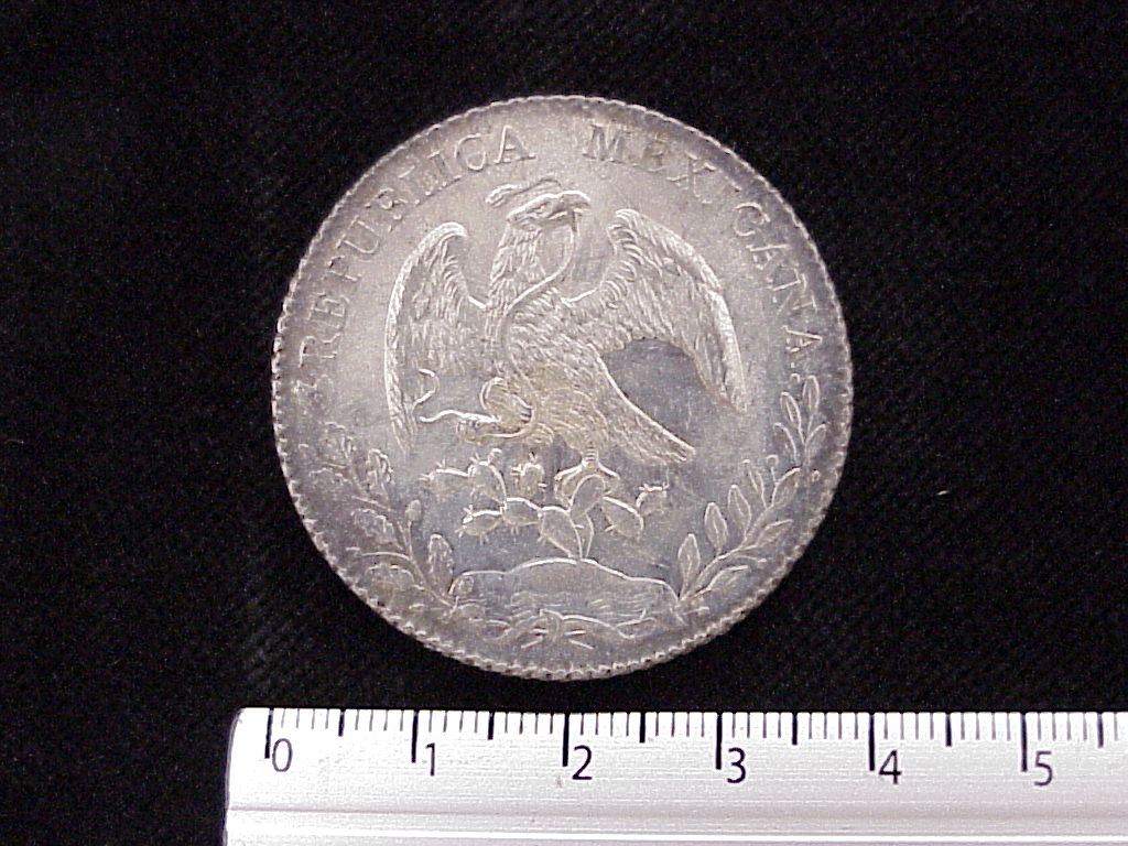 8 Plata 1883 . Inventario Banxico 4424 (anverso)