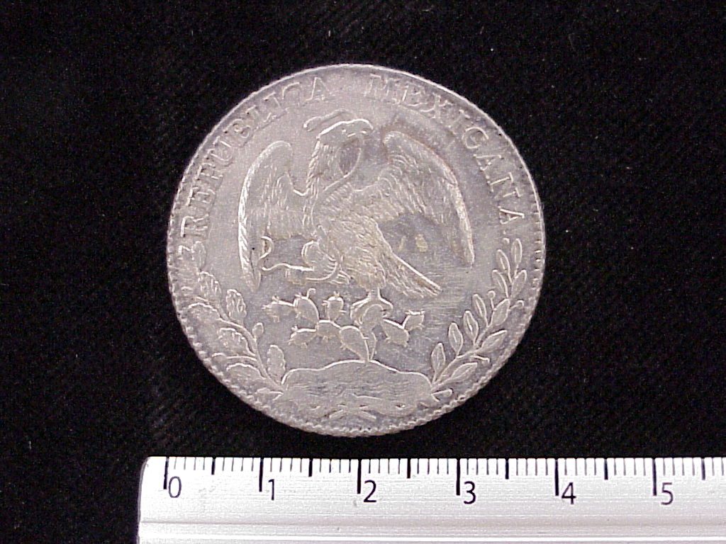8 Plata 1884 . Inventario Banxico 4428 (anverso)