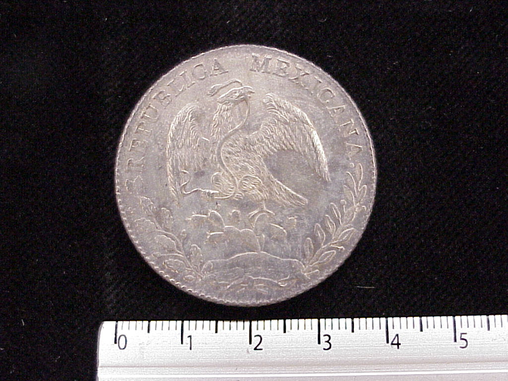 8 Plata 1886 . Inventario Banxico 4434 (anverso)