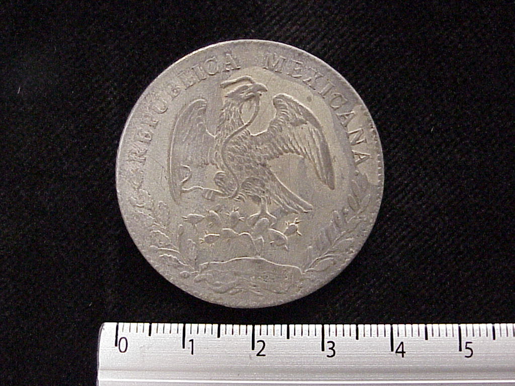 8 Plata 1876 . Inventario Banxico 6001 (anverso)