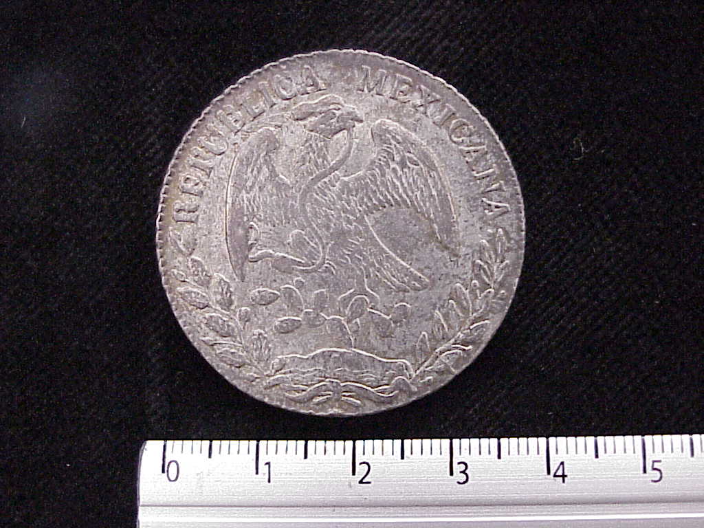 8 Plata 1883 . Inventario Banxico 6590 (anverso)