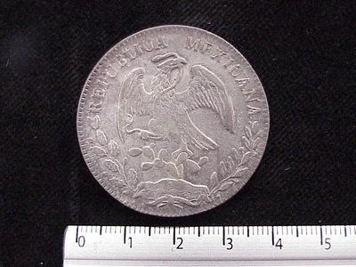 8 Plata 1885 . Inventario Banxico 6599 (anverso)