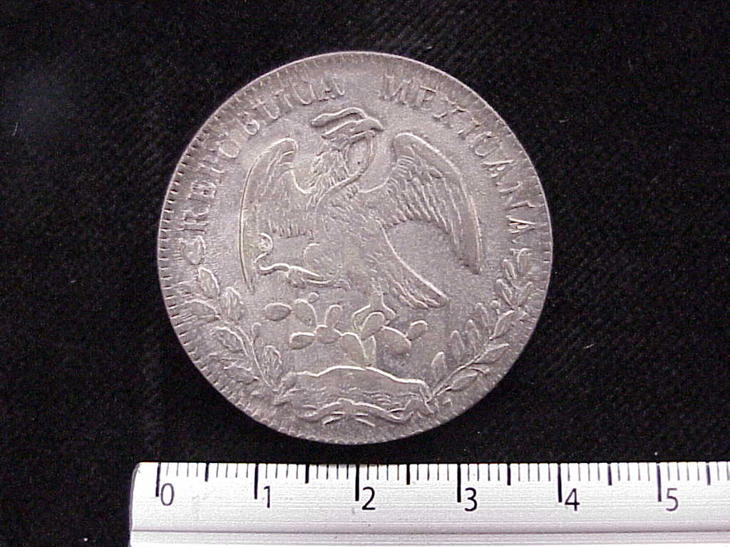 8 Plata 1885 . Inventario Banxico 6599 (anverso)