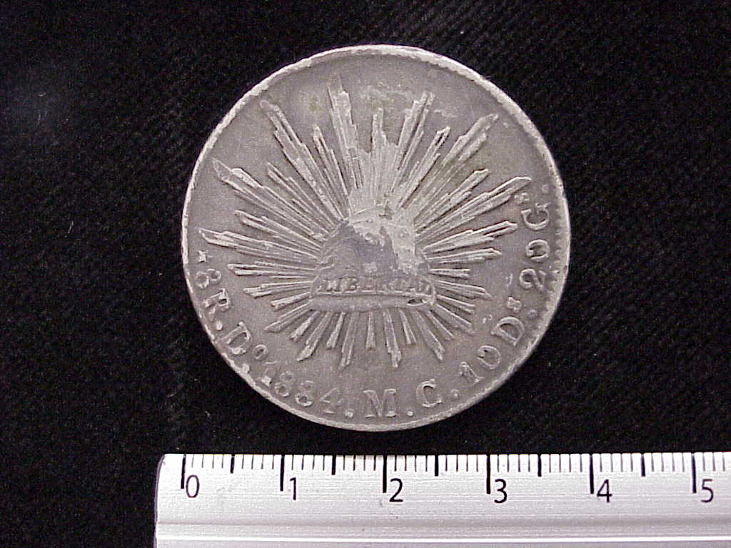 8 Plata 1884 . Inventario Banxico 7005 (anverso)