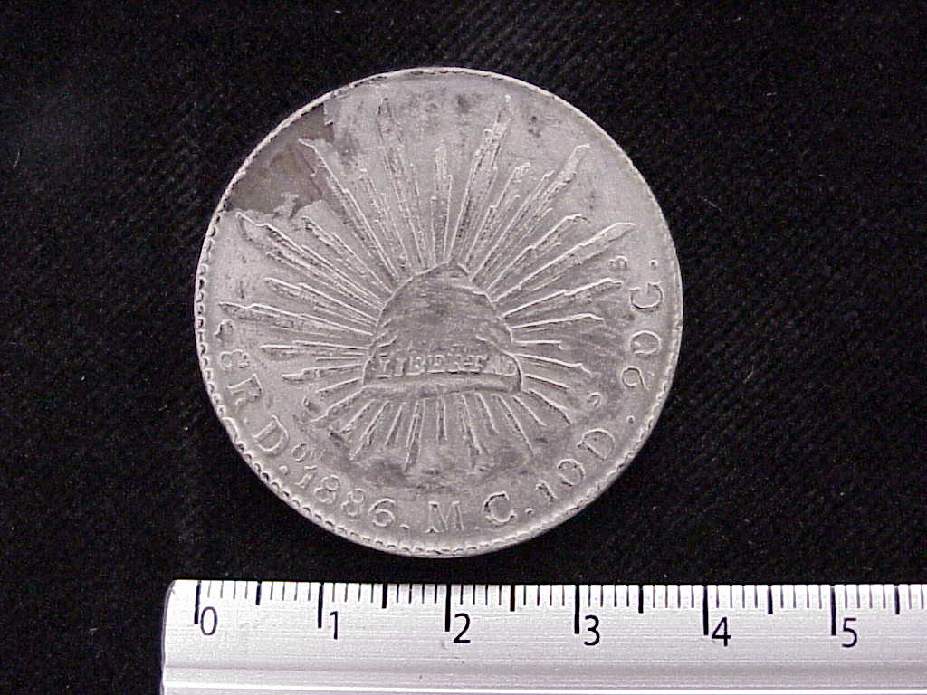 8 Plata 1886 . Inventario Banxico 7014 (anverso)