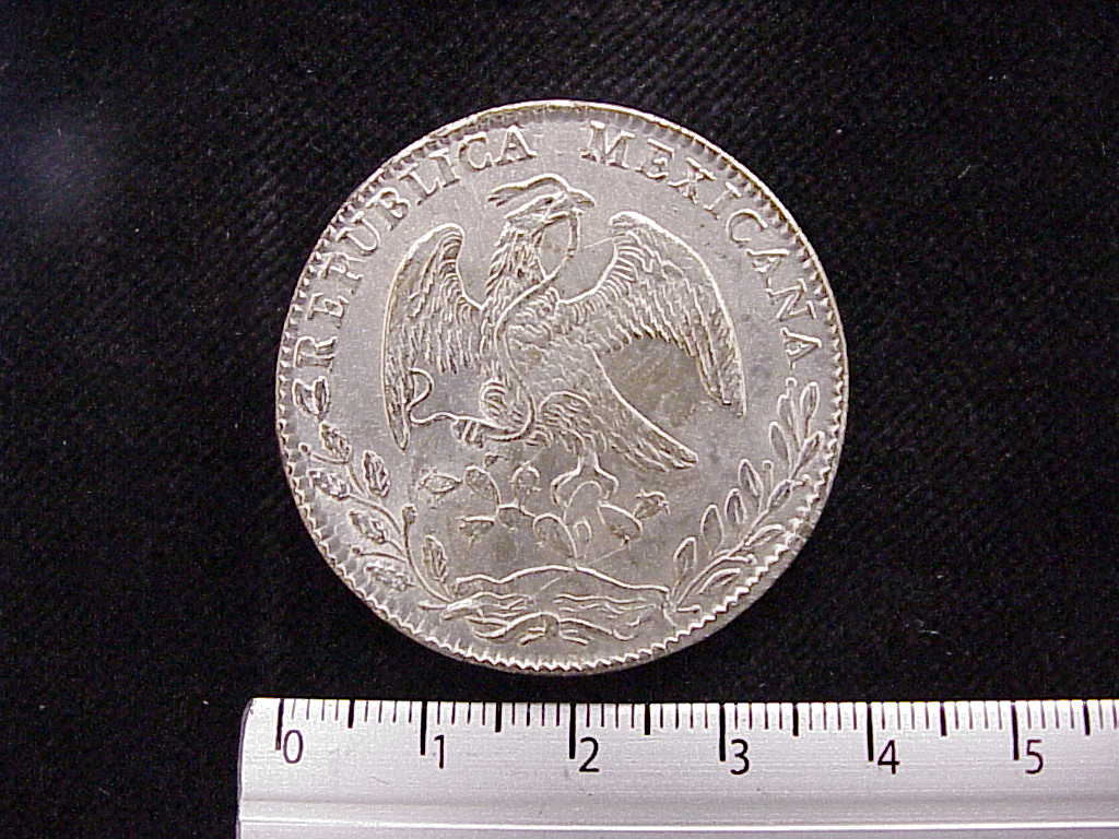 8 Plata 1884 . Inventario Banxico 8244 (anverso)