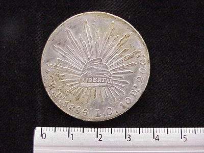 8 Plata 1886 . Inventario Banxico 9675 (reverso)